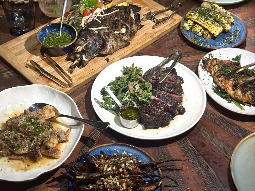 A spread of dishes at Koast restaurant on Maui