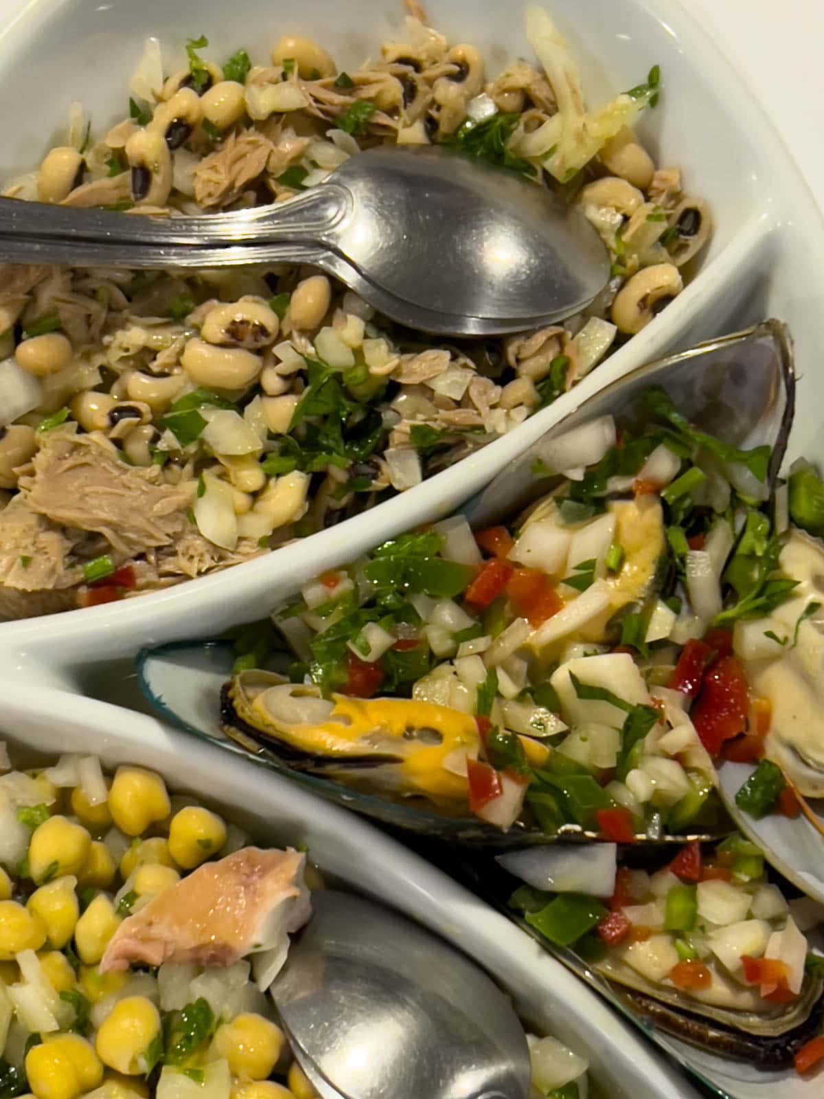 A rich and hearty bowl of Feijoada, a traditional black bean and meat stew.